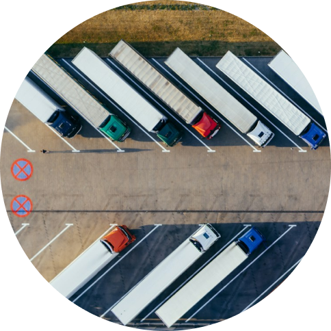 Aerial view of trucks parked diagonally
